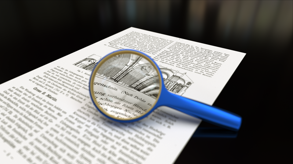 File:Magnifying glass with focus on paper.png